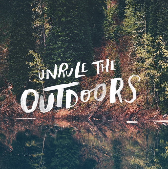 Image of lake and trees with white text unrule the outdoors
